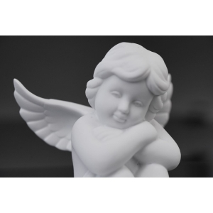 69166 ROSENTHAL FIGURKA SIEDZĄCEGO ANIOŁKA ZE ŚWIECZNIKIEM WYSOKOŚĆ 10 CM (2).JPG