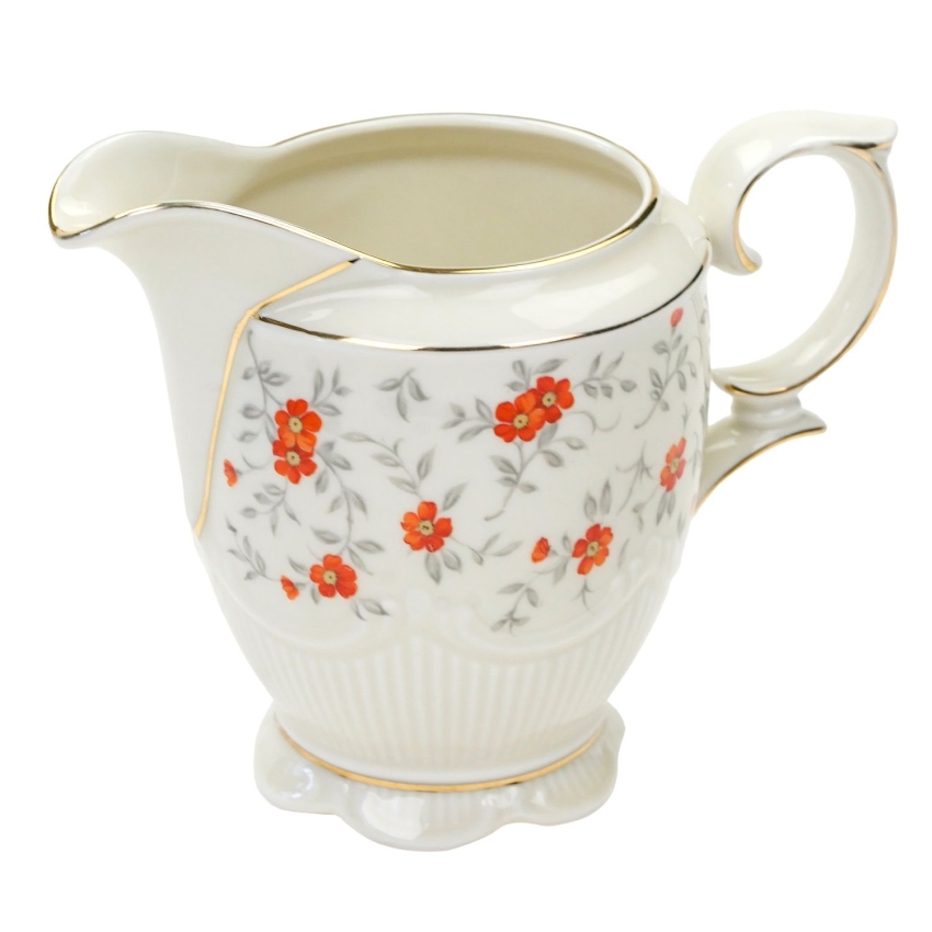 72443 CARL SCHUMANN KOŚĆ SŁONIOWA POMARAŃCZOWE KWIATUSZKI MLECZNIK (1).jpg